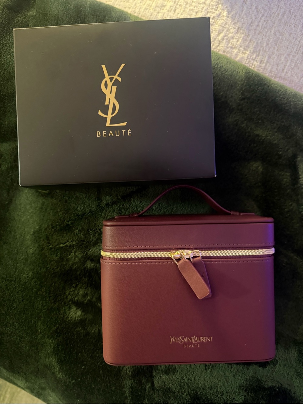 Yves Saint Laurent Burgundy beauty vanity bag